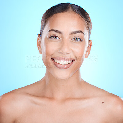 Buy stock photo Face portrait, skincare and beauty of woman in studio isolated on a blue background. Cosmetics, makeup or happy young female model from Brazil with healthy and glowing skin after spa facial treatment