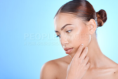 Buy stock photo Beauty, woman and skincare for a cosmetic treatment on a blue studio background for health. Dermatology, skin care and female with facial wellness aesthetic on a mockup or copyspace backdrop
