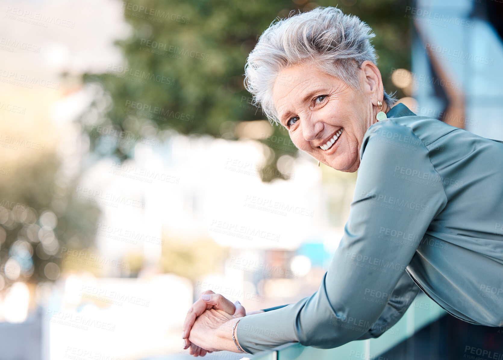 Buy stock photo Portrait, city and mockup with a woman manager in business standing outdoor on the balcony of her office. Face, happy and smile with a senior female CEO or boss outside during summer in an urban town