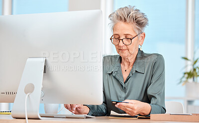 Buy stock photo Business woman, credit card and computer with banking, online shopping and payment for bills on internet in a office. Senior woman, ecommerce and transfer money on pc at desk at her job and web app