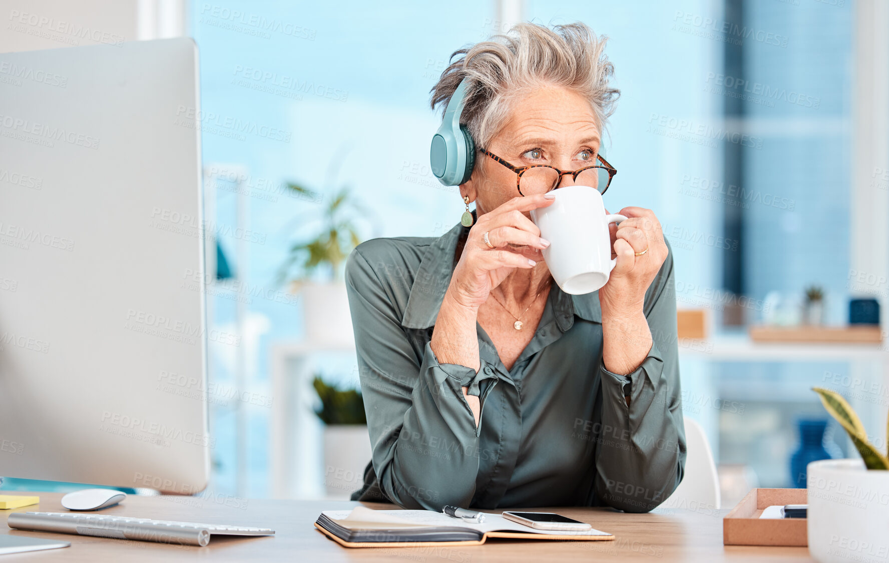 Buy stock photo Office woman, headphones and coffee break at her desk for business inspiration, creative planning and brainstorming at a marketing company. Boss thinking of ideas with coffee, and listening to music