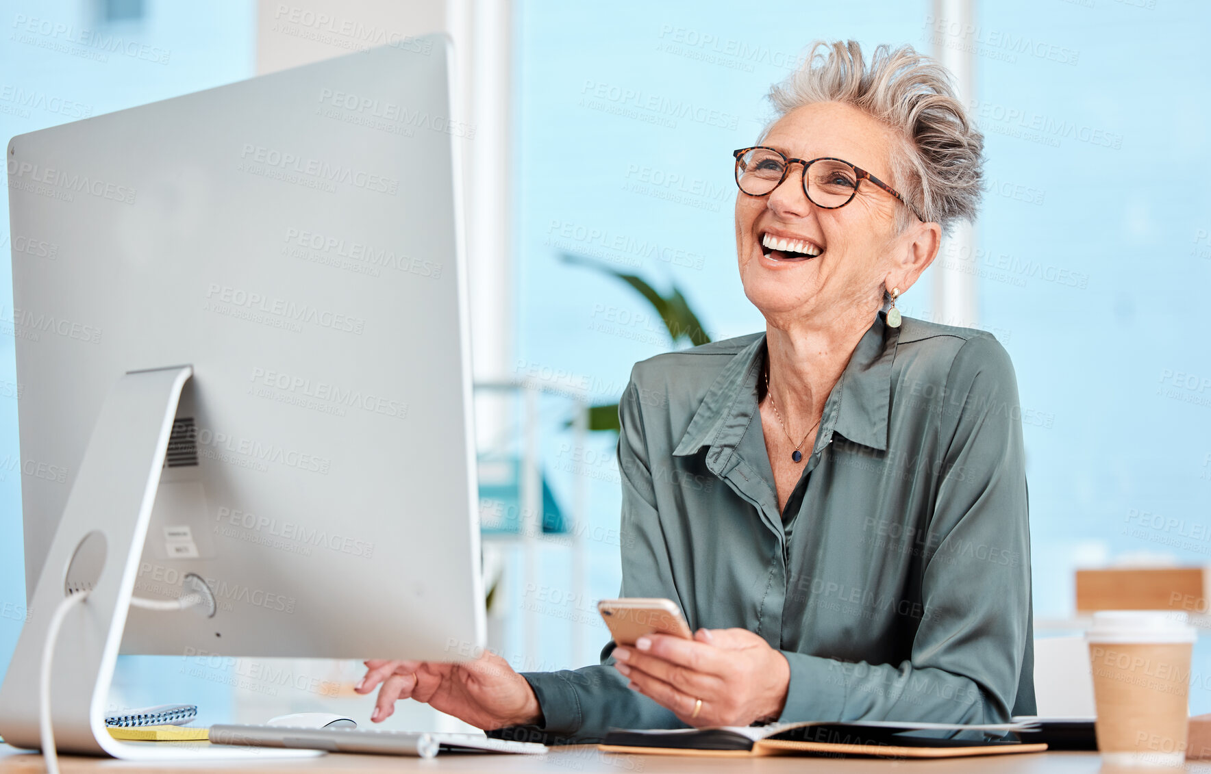 Buy stock photo Happy senior, executive woman and computer at office desk, smile and reading on social media, email or meme. Elderly manager, receptionist or communication expert with happiness, comic or funny laugh