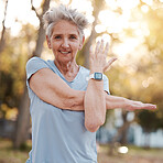 Portrait, fitness and stretching with a senior woman athlete doing a warm up for exercise or training. Park, nature and workout with a mature female getting ready for cardio or endurance in summer