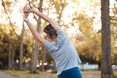 Buy stock photo Fitness, park and stretching with a senior woman doing a warm up outdoor for exercise or a workout. Nature, health and training with a mature female back outside in a garden for a healthy lifestyle