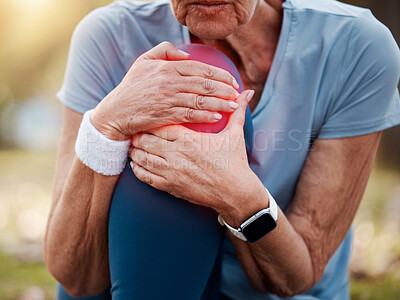 Buy stock photo Fitness, health and senior woman with knee pain outdoors after workout accident. Sports, retirement and elderly female with leg injury, muscle tension or fibromyalgia after training exercise outside.