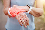 Woman, wrist pain and red injury on sports workout, wellness exercise and health training in forest. Zoom on hands, fitness strain and medical emergency or burnout accident in outdoor nature workout