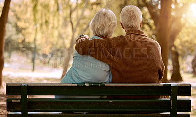Buy stock photo Love, hug and old couple in a park on a bench for a calm, peaceful or romantic summer marriage anniversary date. Nature, romance or back view of old woman and elderly partner in a relaxing embrace