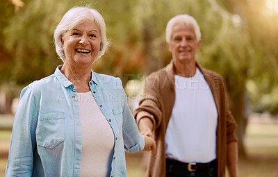 Buy stock photo Old couple, holding hands and portrait in a park for fun bonding in a natural environment. Love, care and happy retired husband and wife in a nature garden with a loving bond in the countryside 