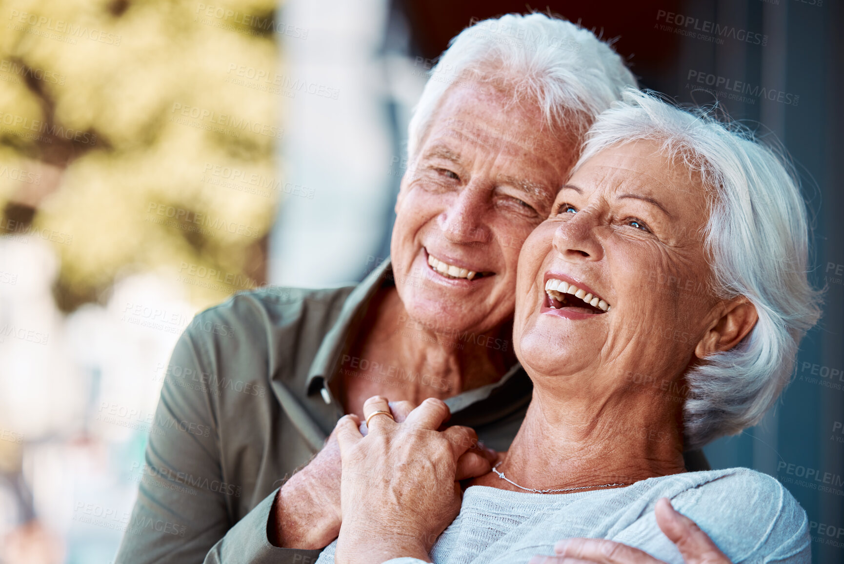 Buy stock photo Senior couple, hug and laugh in park, happy and retirement to relax, wellness and fresh air in nature in Germany together. Happy elderly man, funny woman and playful people love, enjoy joke and love