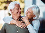 Love, senior couple and hug for happiness, retirement and bonding together outdoor. Romantic, old man and elderly woman embrace, smile and loving for relationship, anniversary and wellness to relax.