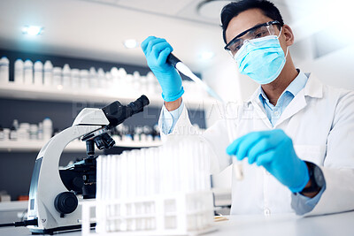 Buy stock photo Covid, microscope and experiment with a man scientist working on research or innovation in a laboratory. Doctor, medicine and safety with a male scientist at work in a lab for a corona virus cure