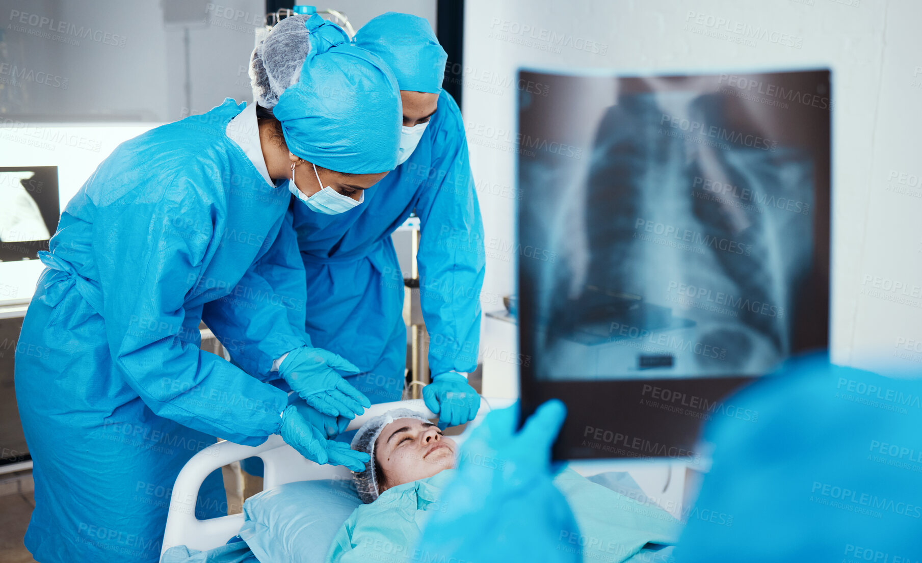 Buy stock photo Patient, surgeon and team in operating room, hospital and healthcare emergency, surgery or medical clinic. Doctors, nursing staff or workers in face mask, blue scrubs and working in operation theatre