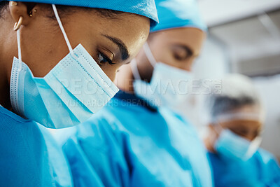 Buy stock photo Health, doctor with face mask and surgery, surgeon and operating room, hospital and healthcare zoom. Professional, operation and focus with medical team, working and health care emergency at clinic.