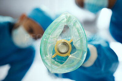 Buy stock photo Closeup oxygen mask, ventilation and doctors in hospital of emergency healthcare, surgery or medicine in operating room. Breathing machine, ventilator and air for patient, lungs and medical operation