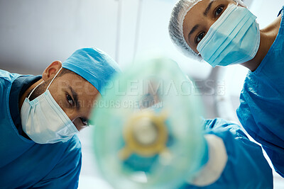 Buy stock photo Health, surgeon and anesthesia, doctors and surgery with medical and cardiovascular healthcare, face mask and low angle view. Medicine, operation and health care team, cardiology and hospital.