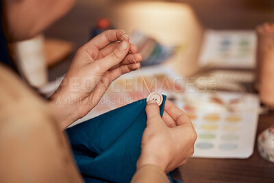 Buy stock photo Hand, button and sewing with a woman designer working in fashion with a material or textile product. Creative, table and fabric with a female entrepreneur working in a studio to sew or tailor