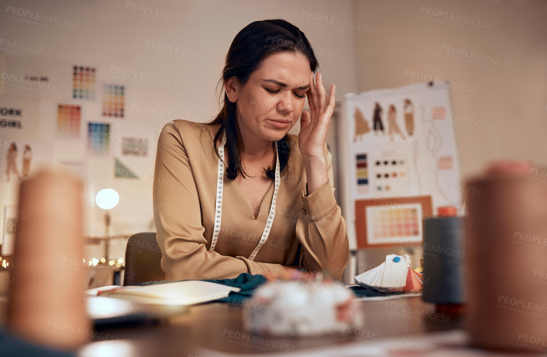 Buy stock photo Stress, depression and headache of tired  fashion designer woman with mental health problem from burnout, doubt and mistake at workshop. Female entrepreneur confused with small business tax and debt