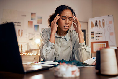 Buy stock photo Designer, headache and woman stress in studio for creative burnout, management anxiety or fashion mistake. Black woman, frustrated and overworked fashion designer or tailor working on clothes design