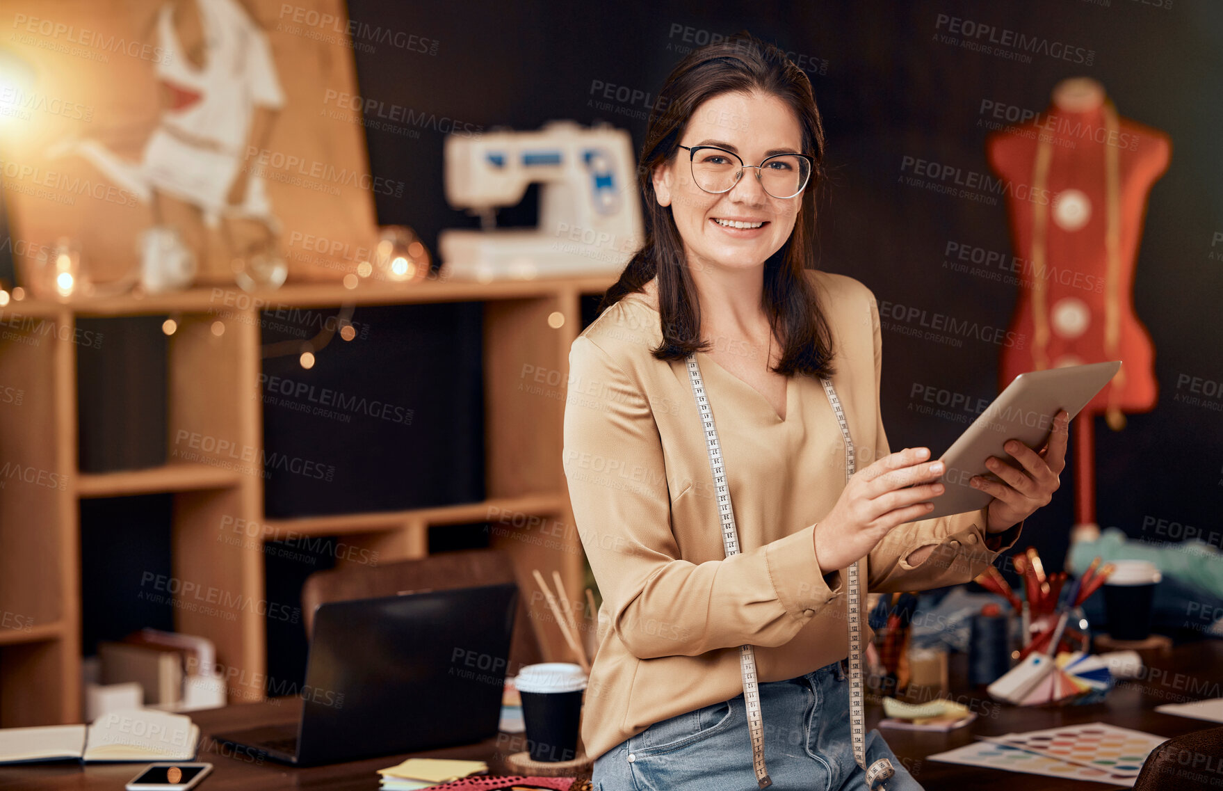 Buy stock photo Portrait, woman or fashion designer with tablet for social media, business promotion or smile in workplace. Young female, entrepreneur or device for online research, advertise and happiness in office