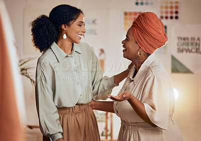 Buy stock photo Designer women, planning conversation and fashion discussion with smile, happy and together in studio. Black woman, design partnership and teamwork talk in workshop for clothes, fabric and happiness