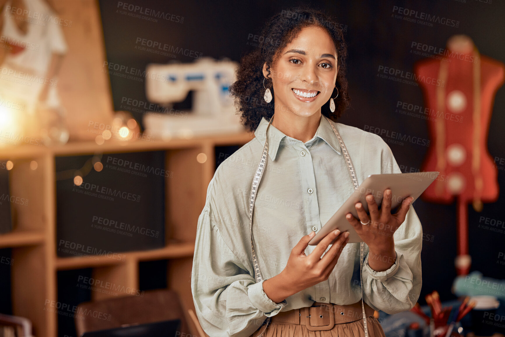 Buy stock photo Fashion designer, woman and tablet in in retail studio, manufacturing workshop or small business. Portrait, smile and happy seamstress with digital technology for clothing ideas, innovation or vision