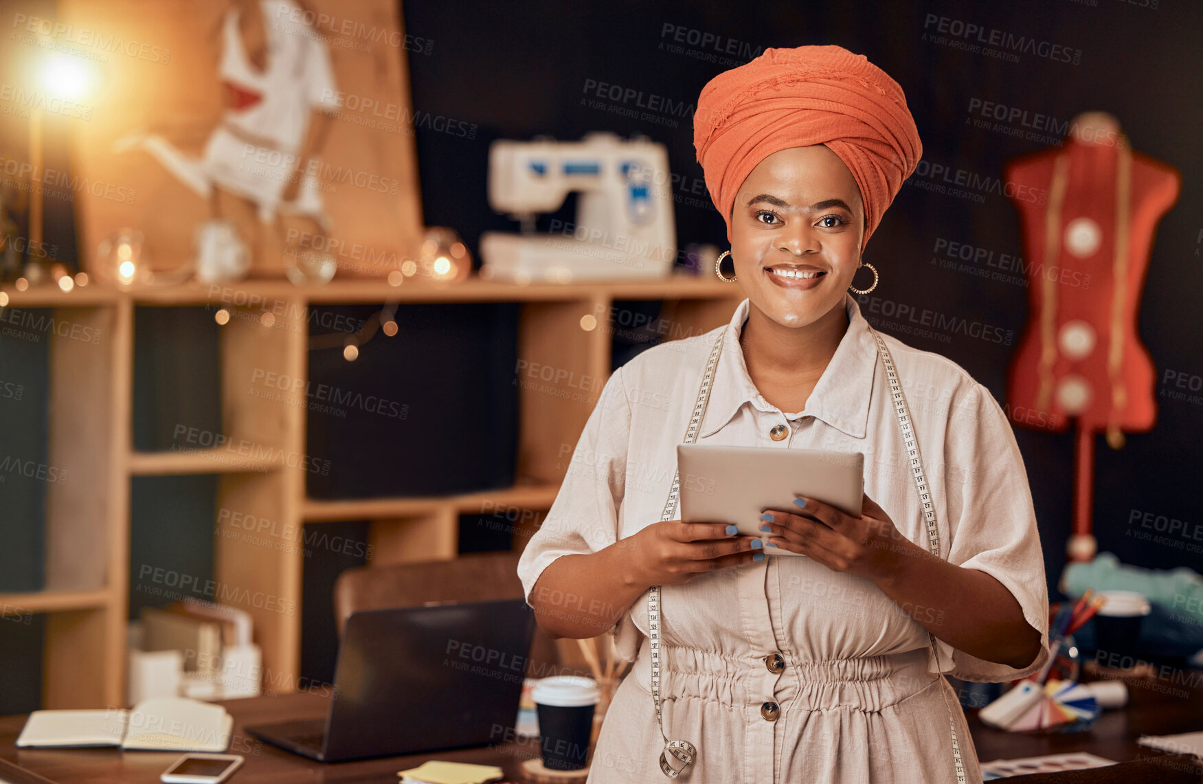 Buy stock photo Portrait, fashion and black woman with tablet, designer and workspace with confidence, online research and smile. Young female tailor, entrepreneur or business owner with device, clothing and website