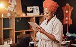 Fashion, designer and leadership with black woman and tablet for creative, luxury and manufacturing in small business. Factory, schedule and planning with tailor in workshop for retail boutique