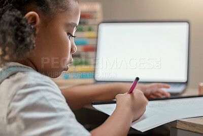 Buy stock photo Home, elearning and little girl writing on paper with mockup screen on laptop for education. Focus, remote student and black child busy with homework at study desk in house with concentration.