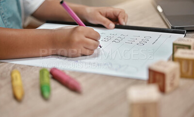Buy stock photo Education, paper and hands of child writing math homework, learning and study numbers for youth child development. Table, pen and young school student studying mathematics in kindergarten classroom