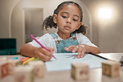 Buy stock photo Girl, homework and writing on paper, learning and homeschool with math, education and knowledge at table in home. Latino child or student in brazil with concentration, school work and study in house