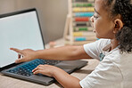Girl learning, home and laptop for reading, study and e-learning at desk with blurred background. African female, child student and computer with tech, web and app for home school, class or studying