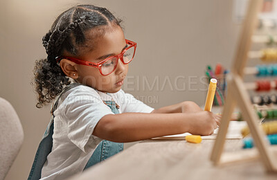 Buy stock photo Home learning, education and girl in kindergarten studying math and knowledge development. House, student and assessment focus and writing of a child working on numbers for a study test  at a desk