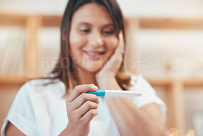 Buy stock photo Hand, pregnancy test and results with a surprised woman looking at a home testing kit with a positive reading. Mother, pregnant and wow with a young female in her house with an excited expression