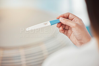 Buy stock photo Woman, hands and pregnancy test with negative results, information and lines at home. Closeup of girl check infertility with stick for maternity, family planning and ovulation for prenatal healthcare