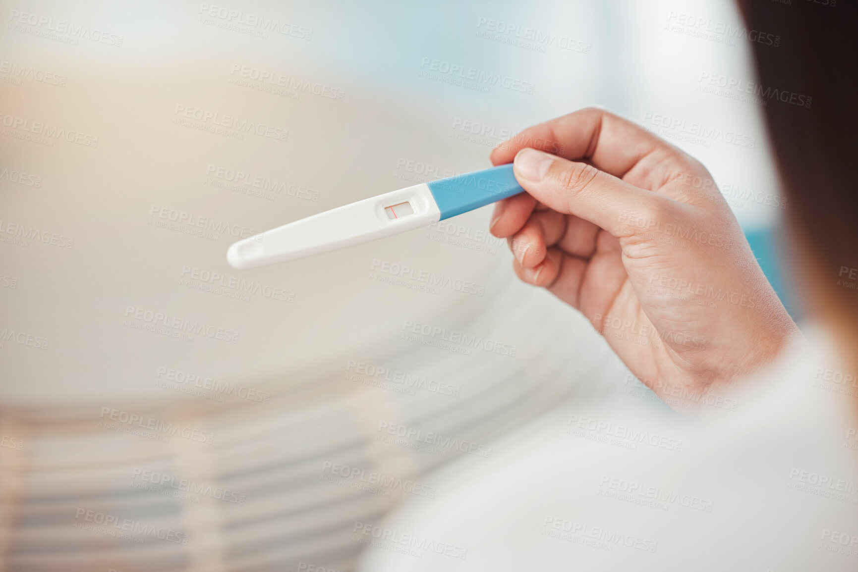 Buy stock photo Woman, hands and pregnancy test with negative results, information and lines at home. Closeup of girl check infertility with stick for maternity, family planning and ovulation for prenatal healthcare