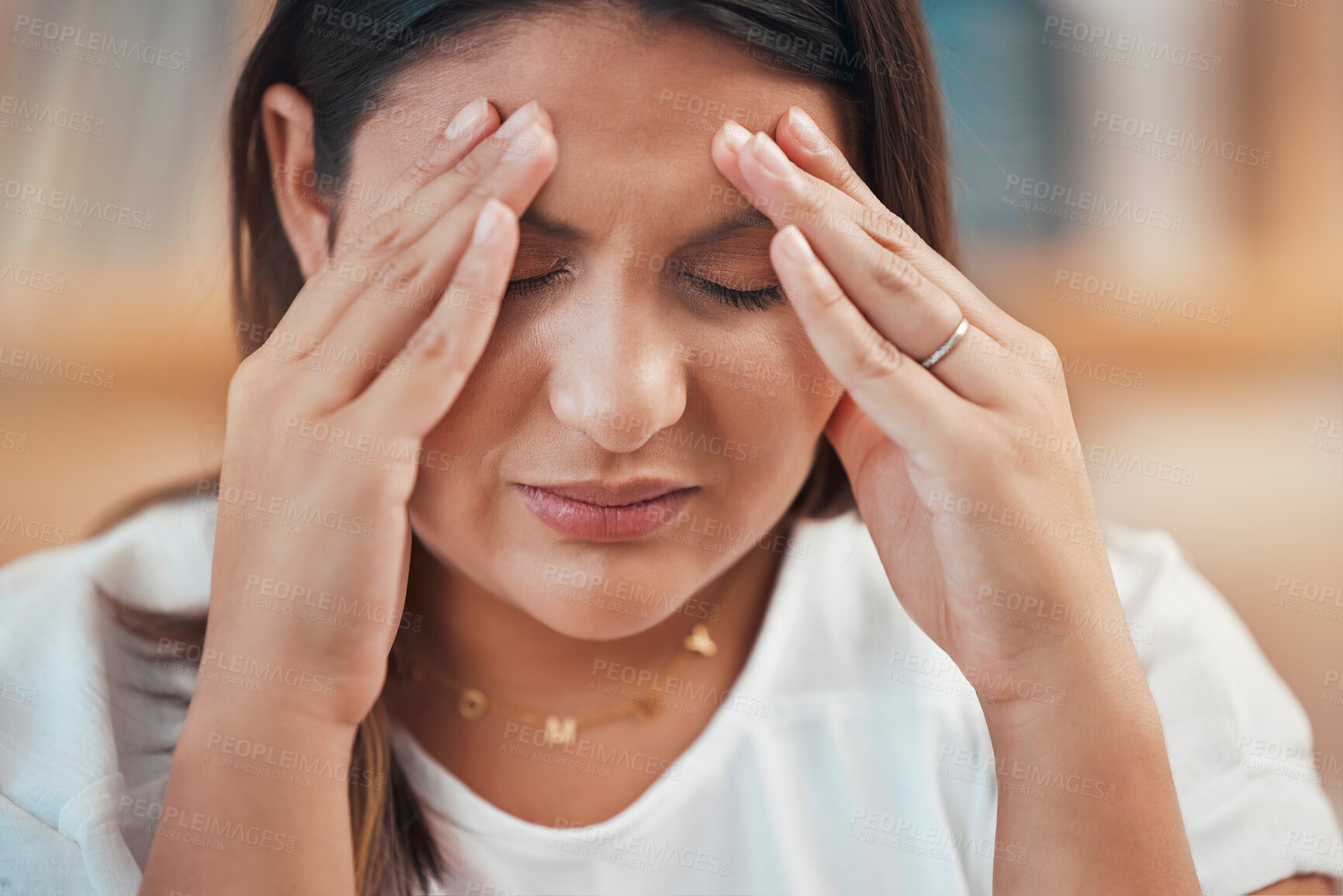 Buy stock photo Headache, stress and anxiety with a business woman holding her head in pain while feeling pressure. Burnout, mental health and migraine with a female employee struggling to make a project deadline 