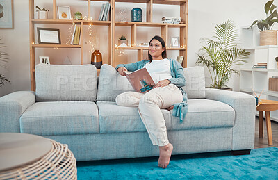 Buy stock photo Pregnant woman, sofa and book for reading, idea or thinking for vision, planning or inspiration in living room. Mother, books and goals for success to relax, rest and smile on lounge couch in Atlanta