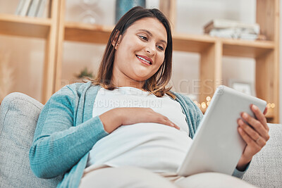 Buy stock photo Digital tablet, pregnant and happy woman relaxing on a sofa in the living room of her home. Calm, pregnancy and lady resting and watching a video on social media or a movie online with mobile device.