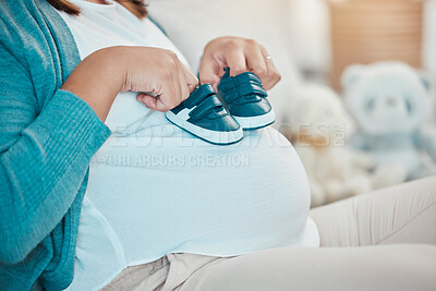 Buy stock photo Pregnant woman hands, baby shoes and stomach with love and care while excited for birth, childbirth and motherhood. Female pregnancy belly, anticipation and hope for future as mother during maternity