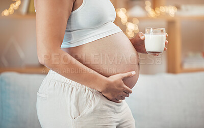 Buy stock photo Woman, pregnant stomach and glass of milk for nutrition, wellness or healthy diet of future baby. Pregnancy, abdomen and lady drinking dairy for body care, maternity and vitamins, protein and calcium