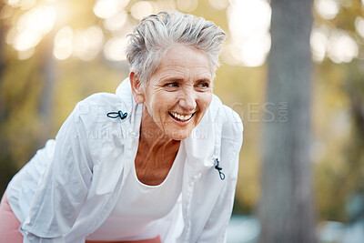 Buy stock photo Fitness, running and park with a senior woman athlete outdoor in nature for exercise or cardio training. Tired, rest and workout with a mature female runner in a garden during summer for endurance