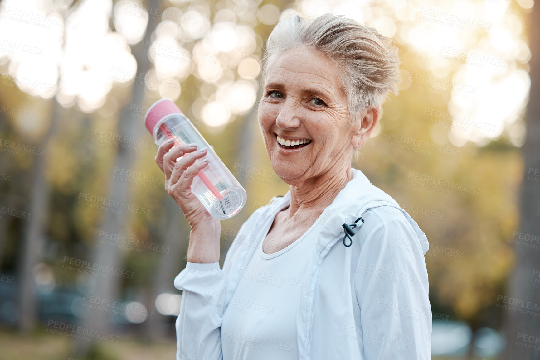 Buy stock photo Exercise, senior woman and water bottle for fitness, workout in nature or portrait. Mature female, elderly lady and hydration for wellness, health and training outdoor for cardio, retirement or relax