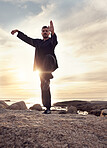 Man, tai chi and meditation while calm, mindfulness and wellness for mindfulness, balance and relax at the beach. Male meditate, training and spiritual faith outdoor at ocean during sunset in summer