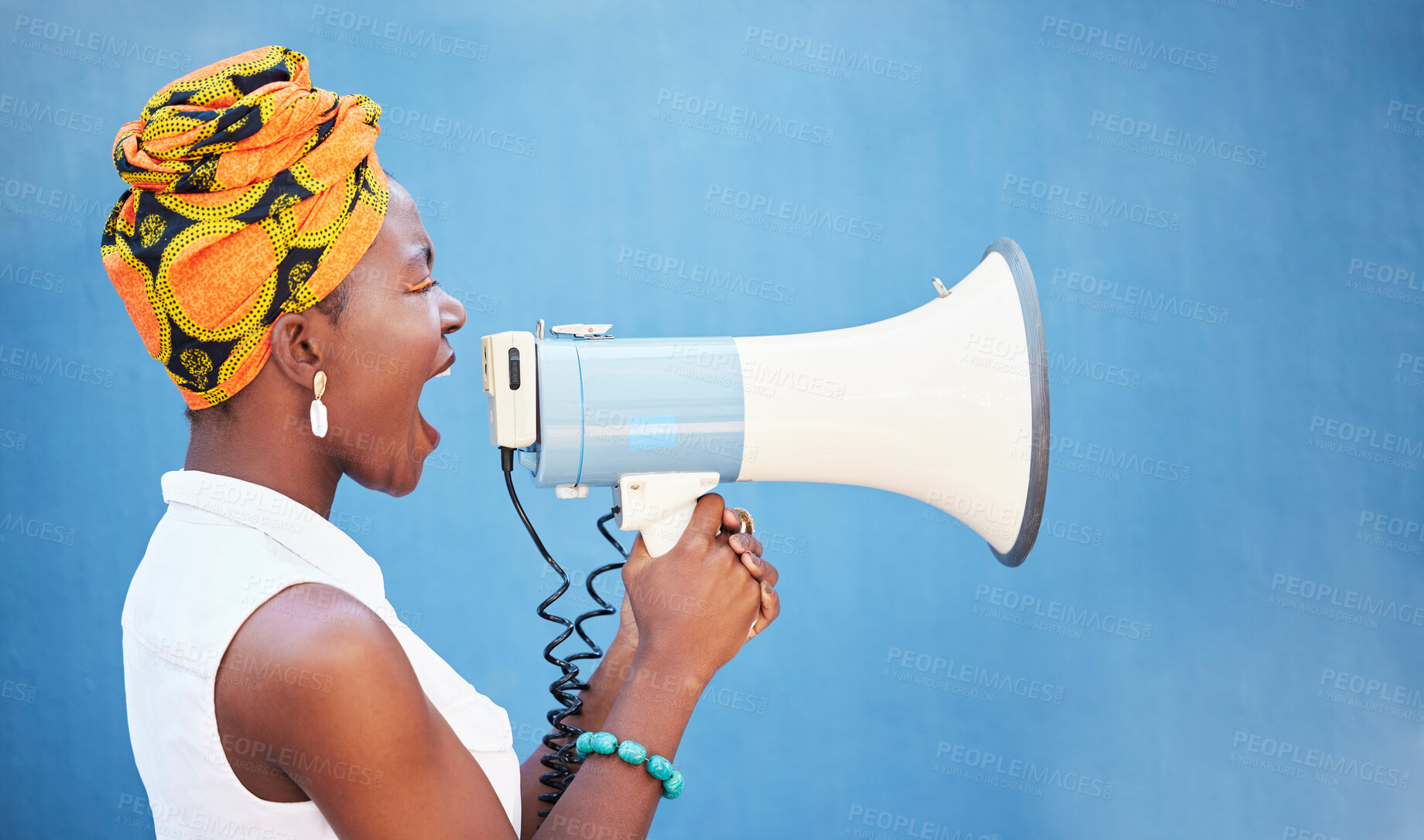 Buy stock photo Black woman, megaphone and free space for freedom of speech, justice and equality on blue background for change, motivation and announcement. African female with microphone for protest or broadcast