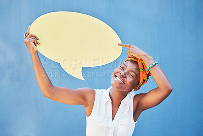 Buy stock photo Speech bubble, smile or black woman with mock up for advertising, marketing or communication feedback with blue background. Happy, announcement sign or girl for brand vote, voice opinion or review