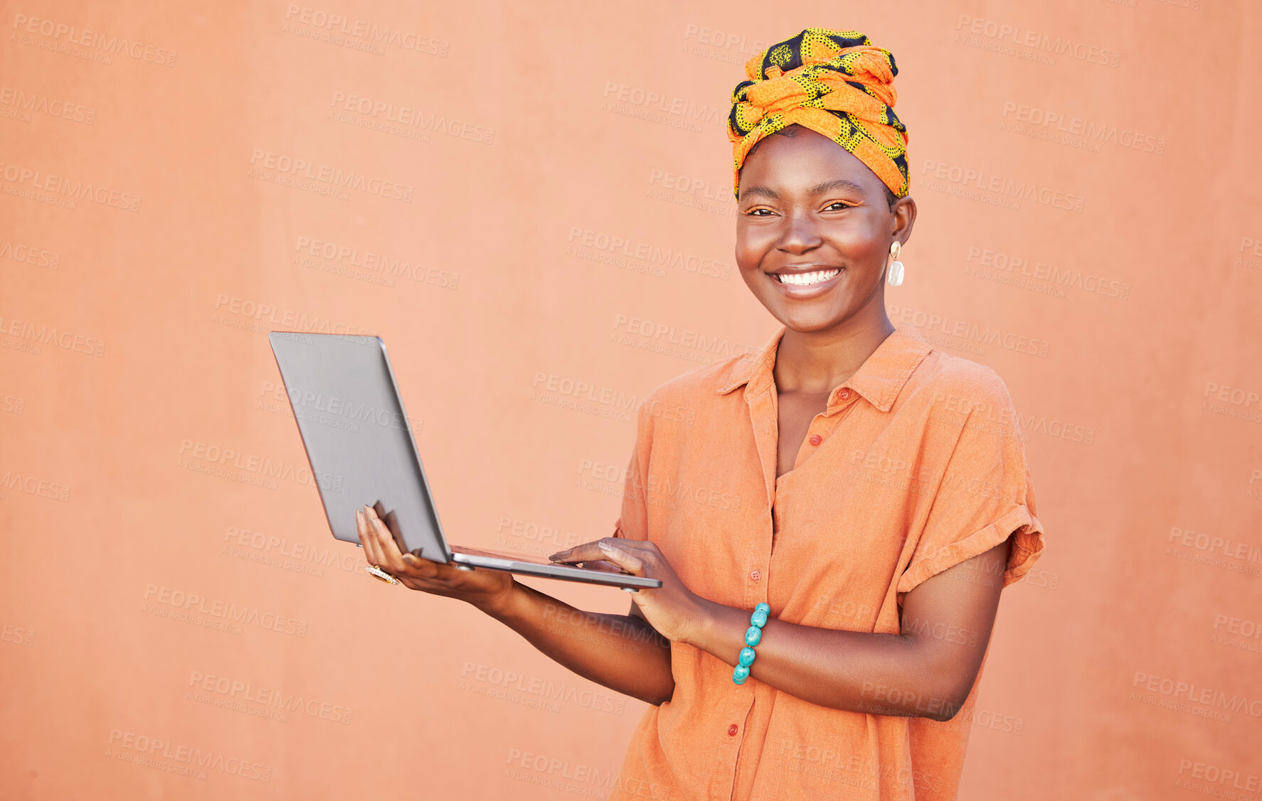 Buy stock photo Laptop, happy and black woman by a wall in the city while doing research on an internet website. Happiness, technology and portrait of a African lady with a computer in a urban town in South Africa.