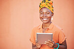 Black woman, tablet and marketing, advertising portrait with technology mockup against orange studio background. Internet, online connection and wifi, 5g network in Nigeria and digital product promo.