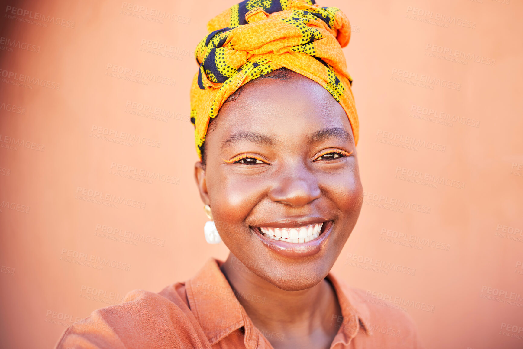 Buy stock photo Black woman, selfie and beauty with makeup, smile and urban wall background with scarf on head. Happy african woman, traditional fashion and cosmetics with digital picture for social media in Kenya