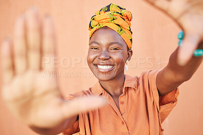 Buy stock photo Black woman, hands and frame with smile in portrait with freedom, lifestyle and happiness against orange studio background. Fashion, African female and happy with Kenya youth, beauty and skin glow.