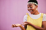 Product placement, marketing and black woman with wow hands, announcement and surprise on a pink mockup studio background. Deal, advertising and African girl with surprise at a logo or branding sale